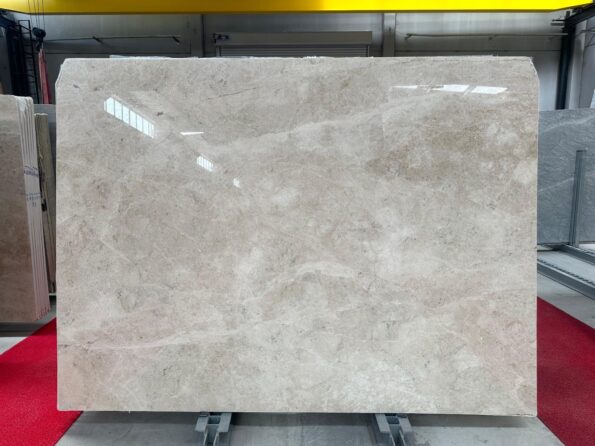 Where is DIAMOND BEIGE marble usually used? DIAMOND BEIGE marble is a versatile material that can be used in a variety of applications in both residential and commercial settings. Some common uses of DIAMOND BEIGE marble include: 1-Countertops: DIAMOND BEIGE marble is a popular choice for kitchen and bathroom countertops due to its durability and elegant appearance. 2-Flooring: DIAMOND BEIGE marble is often used for flooring in high-end residential and commercial spaces such as lobbies, hotels, and museums. 3-Wall cladding: DIAMOND BEIGE marble can be used as a decorative element on walls in both interior and exterior applications. 4-Fireplaces: DIAMOND BEIGE marble is a classic choice for fireplace surrounds and mantels